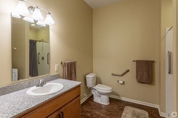 Bathroom With Vanity Lights at The Gardens at Jackson Creek, Independence, Missouri